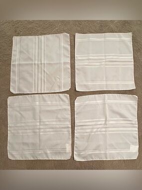 Fashion Industries • set of 4 cream colored napkins • cloth